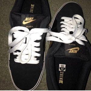 Nike Gold and Black Shoes